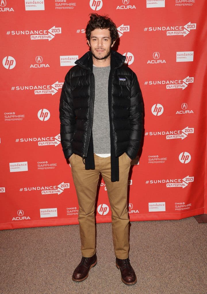 Adam Brody’s Black Puffer & Caramel Chinos Outfit