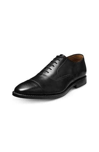 Black cap-toe Oxfords