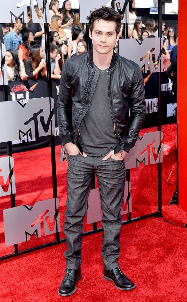 Dylan O’Brien’s Black Leather Bomber & Gray Jeans Outfit