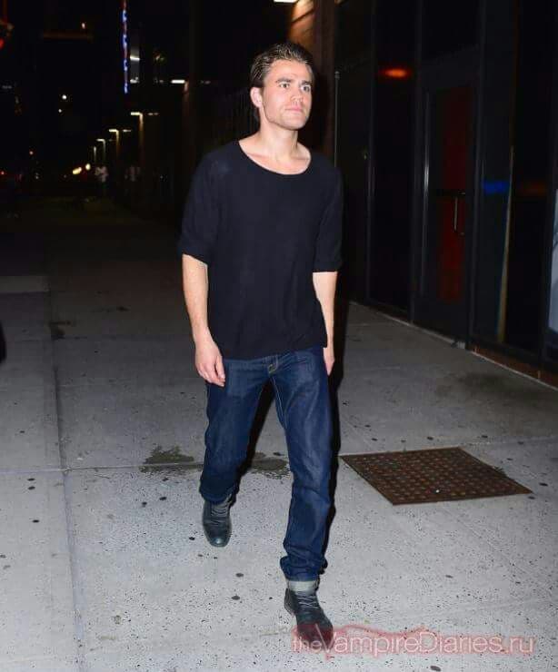 Paul Wesley’s Black Scoop-Neck Tee & Cuffed Jeans Outfit